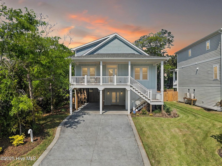 Indulge in refined coastal living within this 2024 Parade of - Beach Home for sale in Oak Island, North Carolina on Beachhouse.com