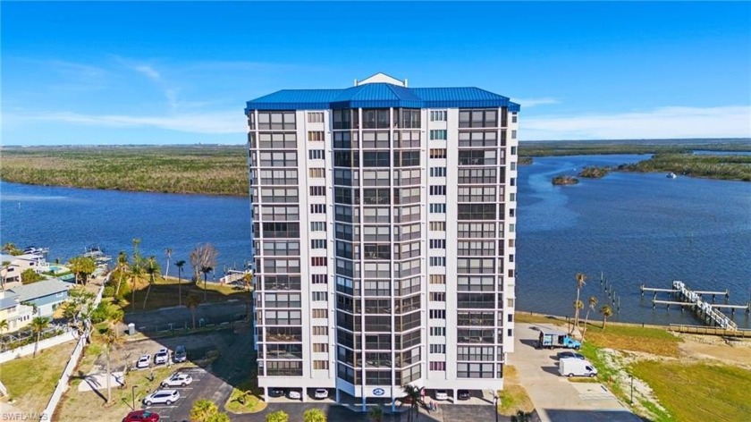 Experience coastal living at its finest in this exquisite Ocean - Beach Home for sale in Fort Myers Beach, Florida on Beachhouse.com