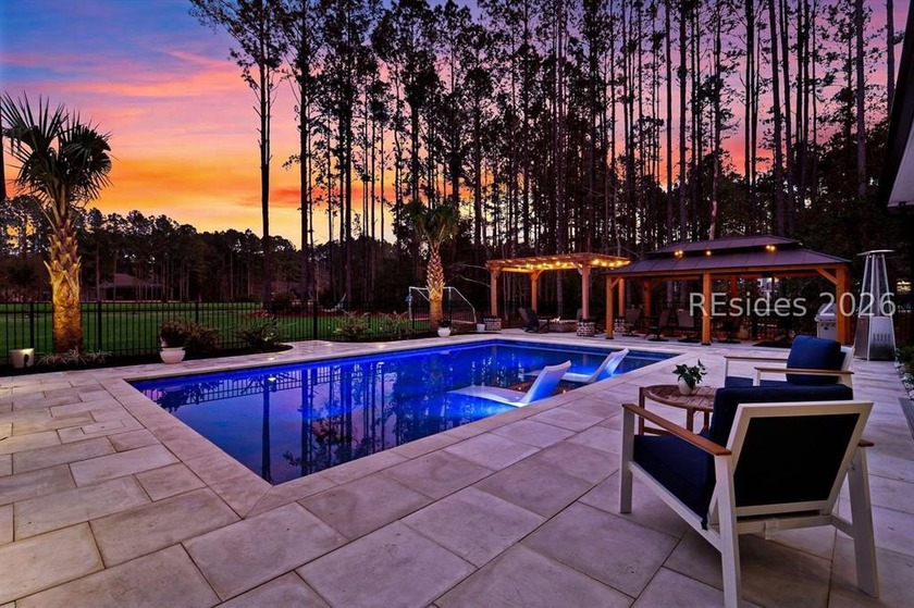 Refined Southern architecture meets true resort-style living at - Beach Home for sale in Bluffton, South Carolina on Beachhouse.com