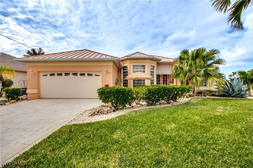 This elegant  - GULF ACCESS WITH NO LOCK - Villa is located just - Beach Home for sale in Cape Coral, Florida on Beachhouse.com