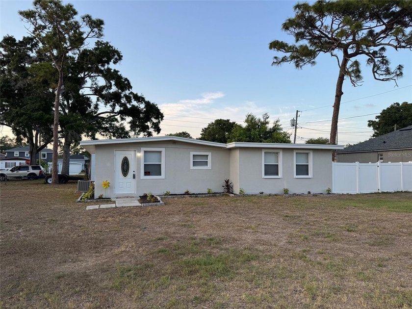 Welcome to this beautifully updated Corner Lot Home in NO Flood - Beach Home for sale in Pinellas Park, Florida on Beachhouse.com