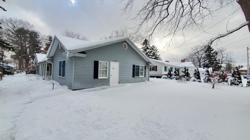 An incredible opportunity awaits in the heart of The Village of - Beach Home for sale in Spring Lake, Michigan on Beachhouse.com