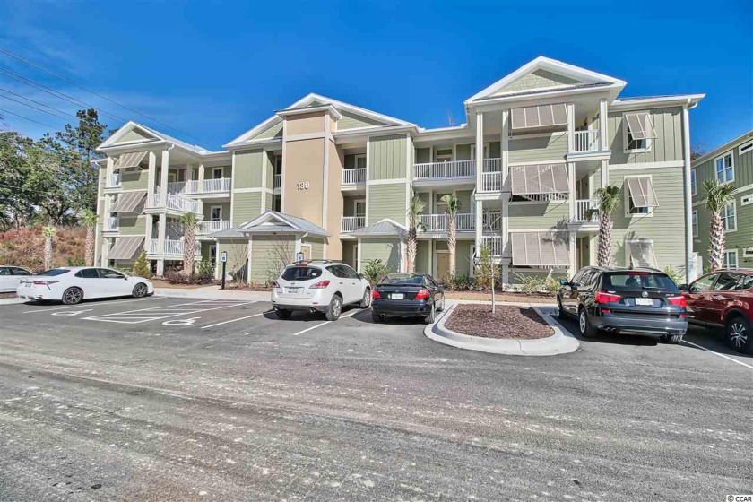 Located in the heart of Pawleys Island, this end unit condo - Beach Condo for sale in Pawleys Island, South Carolina on Beachhouse.com