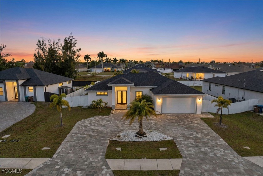 Welcome to this STUNNING, FURNISHED - TURNKEY home built in 2023 - Beach Home for sale in Cape Coral, Florida on Beachhouse.com