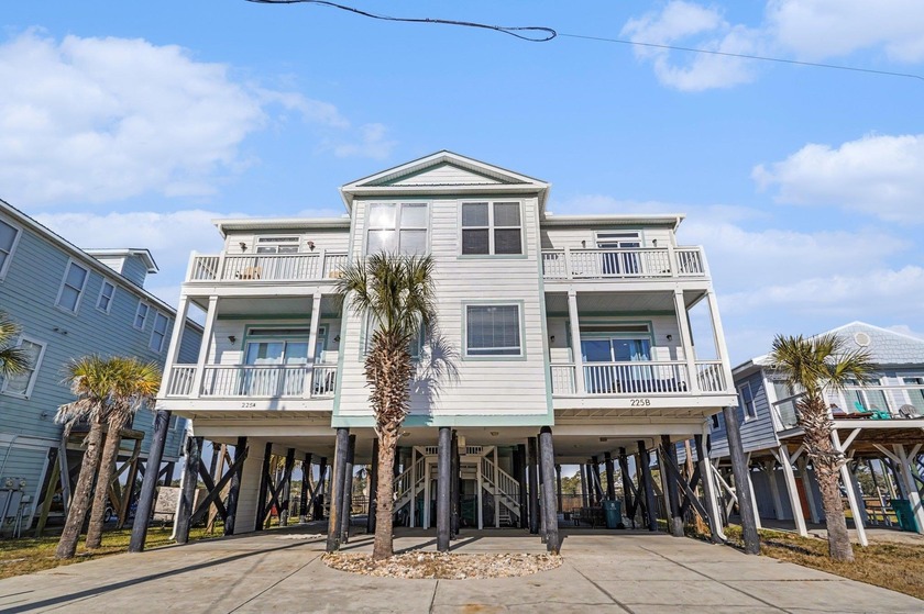 This raised beach house offers five bedrooms and five and one - Beach Home for sale in Murrells Inlet, South Carolina on Beachhouse.com