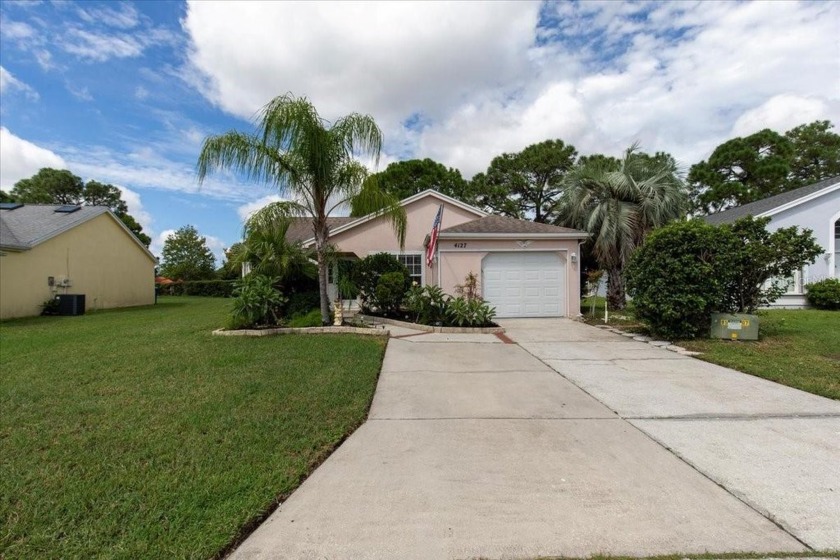 Discover this beautifully maintained home in MillPond Estates - Beach Home for sale in New Port Richey, Florida on Beachhouse.com