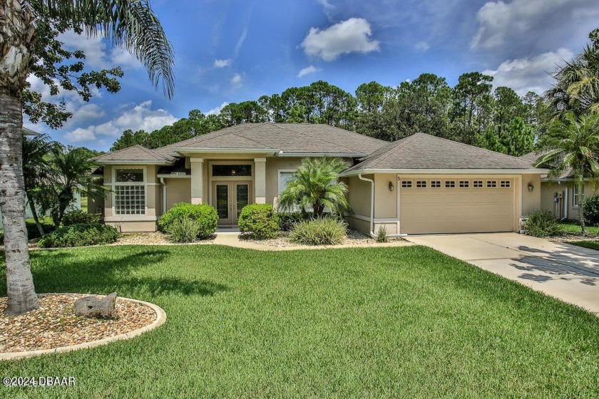 Solar Heated with additional Propane heat Pool Home with Spa on - Beach Home for sale in Ormond Beach, Florida on Beachhouse.com