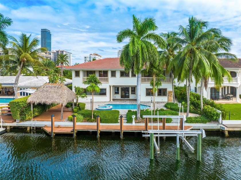 Two-story waterfront home in Golden Isles, epitomizing South - Beach Home for sale in Hallandale Beach, Florida on Beachhouse.com