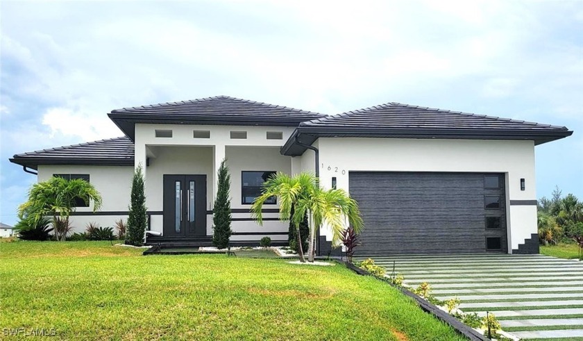 CUSTOM NEW HOME WITH 3 MASTER BEDROOMS, GULF ACCESS, lots of - Beach Home for sale in Cape Coral, Florida on Beachhouse.com