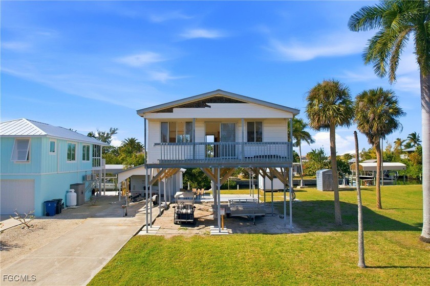 DOUBLE LOT GULF-ACCESS OPPORTUNITY--SELL ONE, REMODEL HOUSE ON - Beach Home for sale in St. James City, Florida on Beachhouse.com