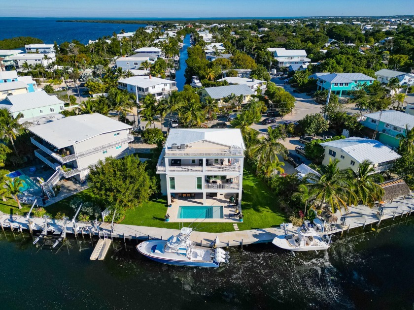 Luxurious elegance and modern amenities throughout this stunning - Beach Home for sale in Plantation Key, Florida on Beachhouse.com