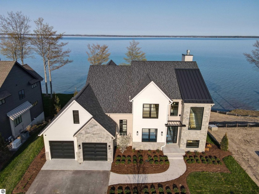 Did somebody say views of the deep blue water from every window? - Beach Home for sale in Traverse City, Michigan on Beachhouse.com