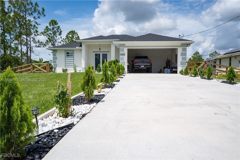 2024 NEW CONSTRUCTION in Lehigh Acres! This 3BR/2BA home offers - Beach Home for sale in Lehigh Acres, Florida on Beachhouse.com