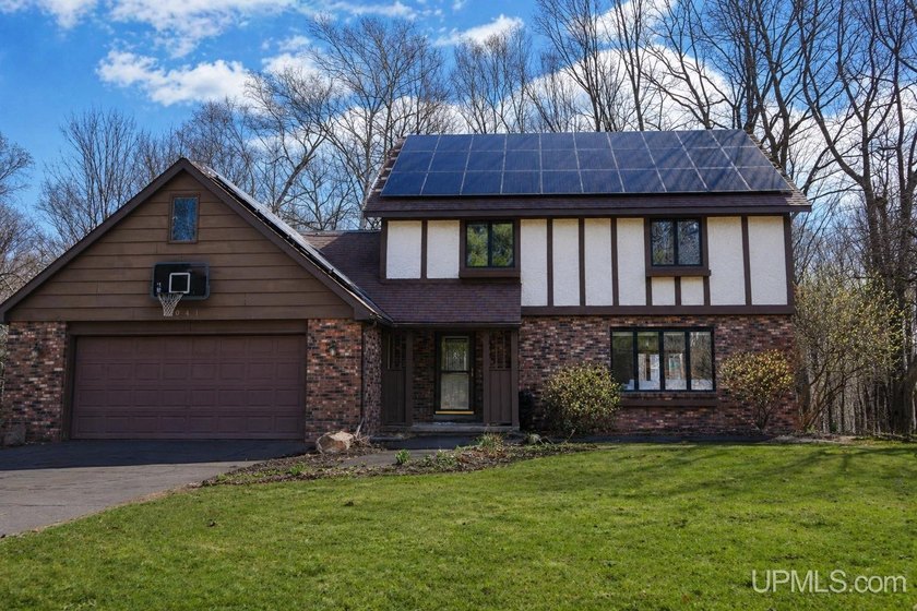 Nestled in one of Marquette's most desirable neighborhoods, this - Beach Home for sale in Marquette, Michigan on Beachhouse.com