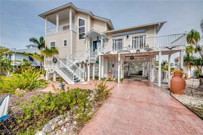 Beautiful KEY WEST style home with DIRECT ACCESS canal, a couple - Beach Home for sale in ST. James City, Florida on Beachhouse.com
