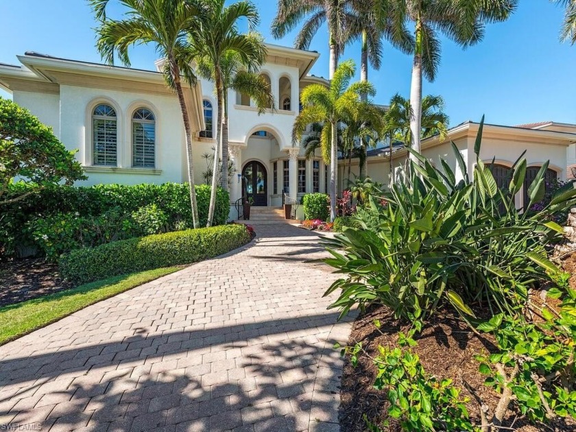This exquisite West facing home on one of the widest canals in - Beach Home for sale in Naples, Florida on Beachhouse.com