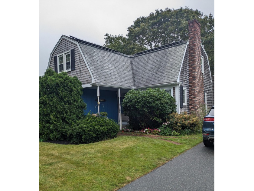 This delightful four-bedroom two bath home sits on a 15700 - Beach Home for sale in Harwich, Massachusetts on Beachhouse.com