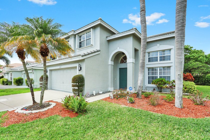 Welcome to this beautifully maintained home located on a private - Beach Home for sale in Boynton Beach, Florida on Beachhouse.com