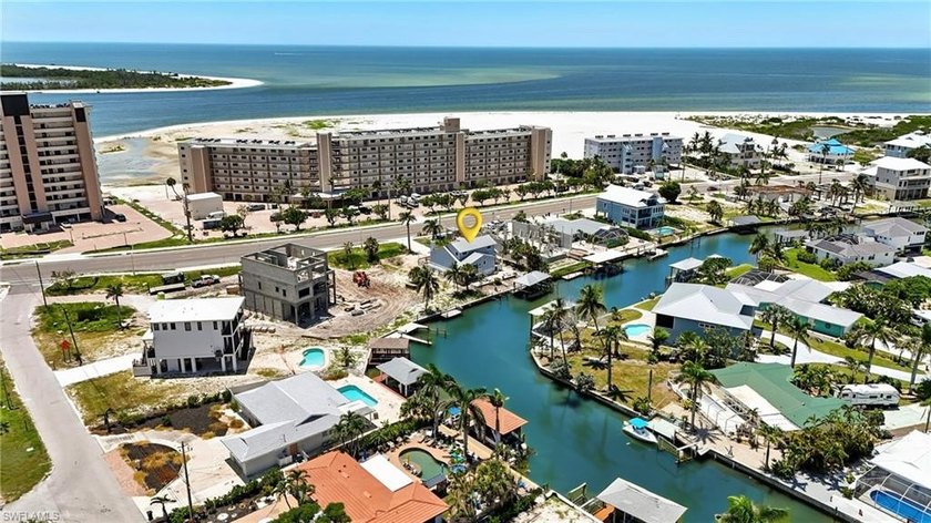 Weekly Rental Zoned!!!Canal-Front Coastal Retreat! 3 Bedrooms, 2 - Beach Home for sale in Fort Myers Beach, Florida on Beachhouse.com