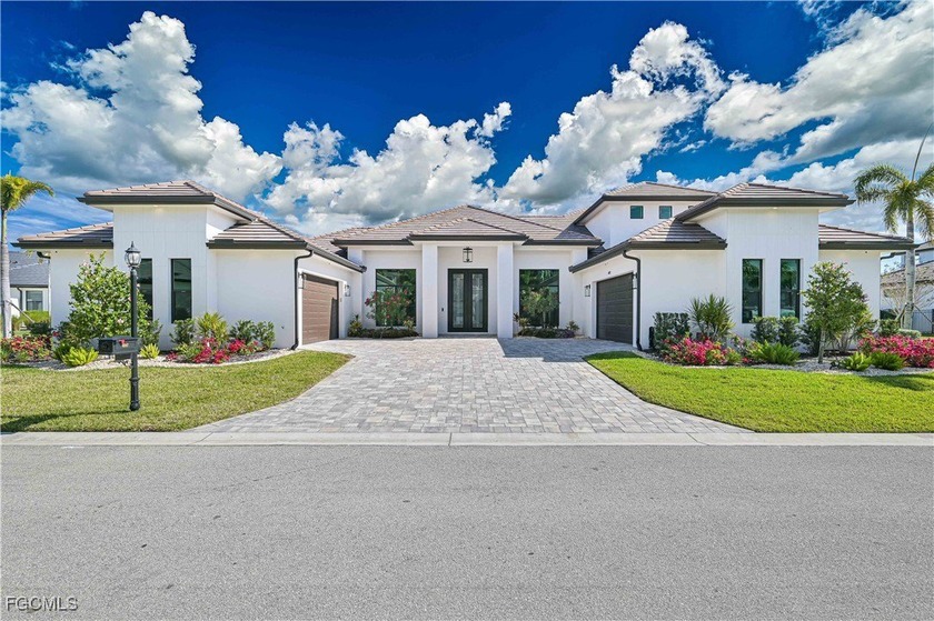 Located within the exclusive double-gated waterfront community - Beach Home for sale in Cape Coral, Florida on Beachhouse.com