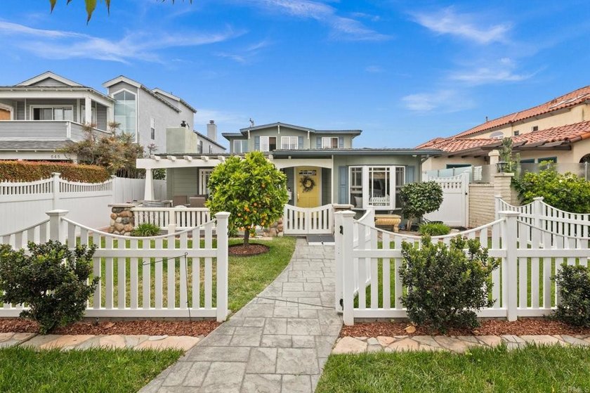 Set on a quiet street just five blocks from the beach, this 3 - Beach Home for sale in Coronado, California on Beachhouse.com
