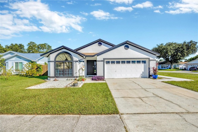 Welcome to this spacious 4-bedroom, 2-bathroom pool home - Beach Home for sale in New Port Richey, Florida on Beachhouse.com