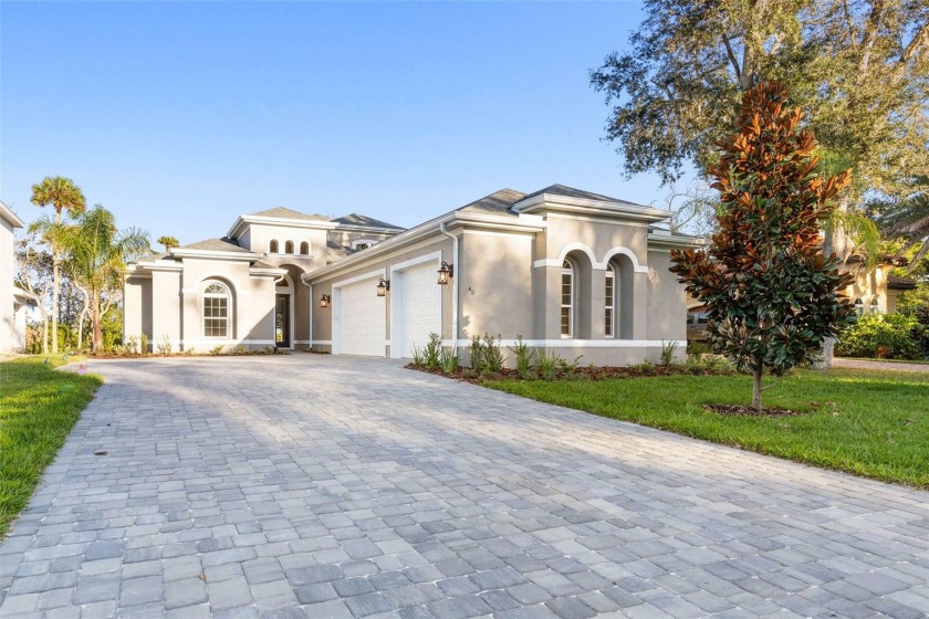 Exquisite New Construction Home with Captivating Waterfront - Beach Home for sale in Palm Coast, Florida on Beachhouse.com