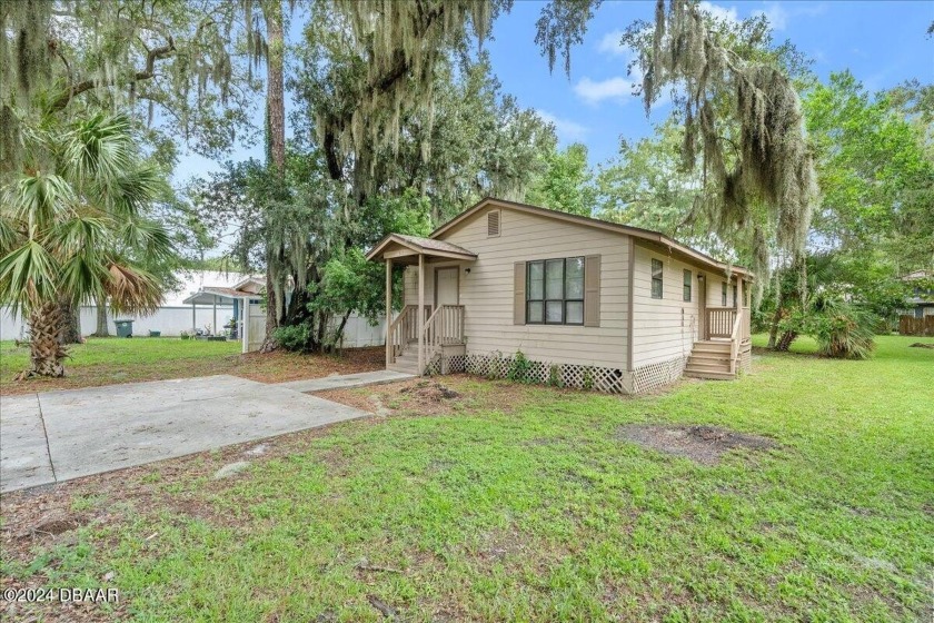 This cute and affordable 4-bedroom, 2-bathroom home in Daytona - Beach Home for sale in Daytona Beach, Florida on Beachhouse.com