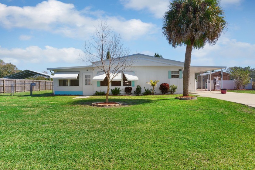 Welcome to your idyllic 2-bed, 2-bath haven on a serene - Beach Home for sale in Cocoa, Florida on Beachhouse.com