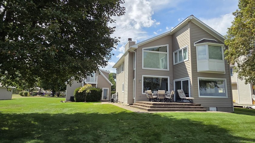 Wake up to breathtaking water views and sunrises in this - Beach Home for sale in Port Sanilac, Michigan on Beachhouse.com