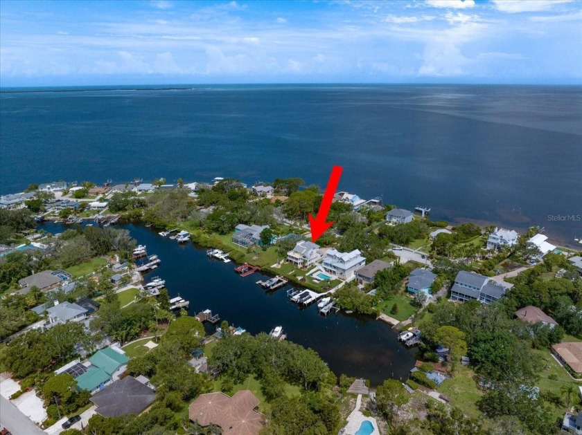 Spectacular waterfront living in the highly sought-after - Beach Home for sale in Holiday, Florida on Beachhouse.com