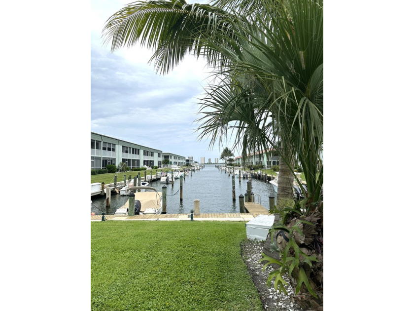 Light bright loft style 2/2 with central atrium has been fully - Beach Townhome/Townhouse for sale in North Palm Beach, Florida on Beachhouse.com