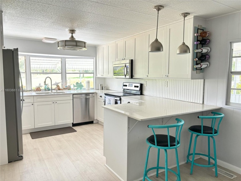 This stunning double-wide modern mobile home is located in a 55+ - Beach Home for sale in Davie, Florida on Beachhouse.com