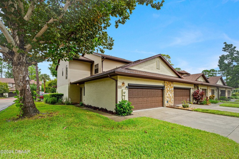 Prepare to be awestruck!  This peaceful community is tucked away - Beach Townhome/Townhouse for sale in Daytona Beach, Florida on Beachhouse.com