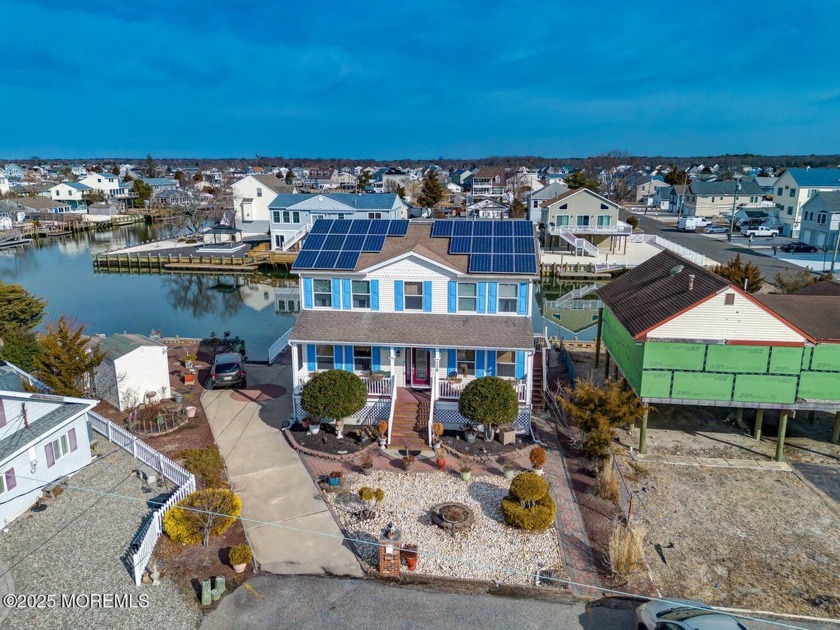 Nestled on a quiet cul-de-sac, this charming raised Colonial - Beach Home for sale in Little Egg Harbor, New Jersey on Beachhouse.com
