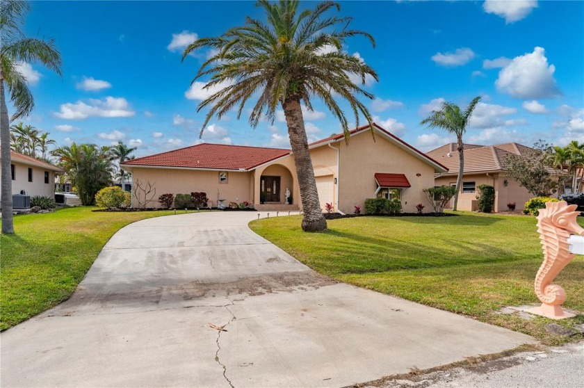 Awesome waterfront home with Hurricane windows, sliders and - Beach Home for sale in Punta Gorda, Florida on Beachhouse.com