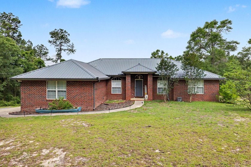 Come in and take a look at this wonderful 3 bedroom 2 bath brick - Beach Home for sale in Baker, Florida on Beachhouse.com