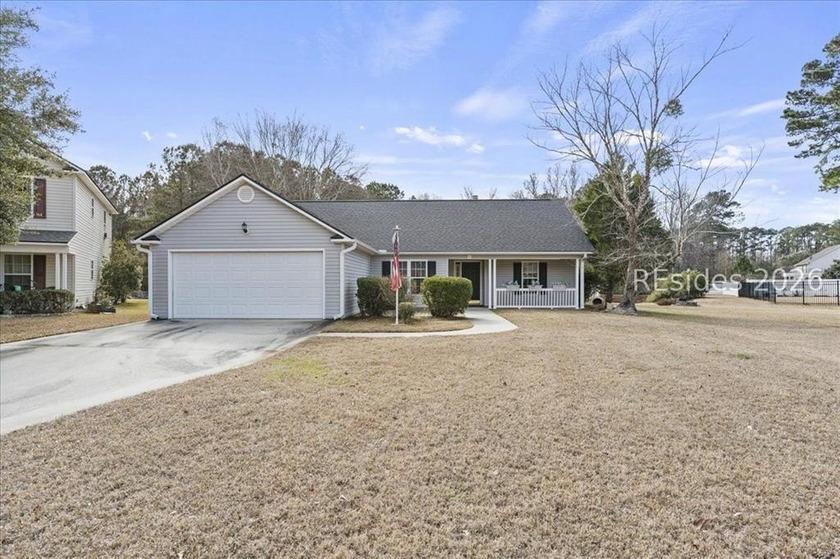 This home has it ALL! Tucked into a wooded and Lagoon view lot - Beach Home for sale in Bluffton, South Carolina on Beachhouse.com