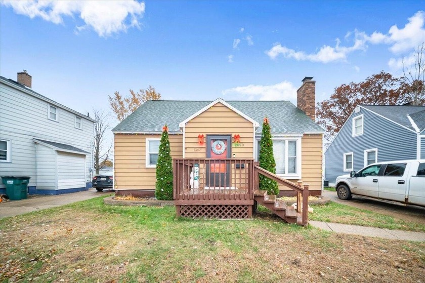 Welcome home to this beautifully updated Cape Cod featuring - Beach Home for sale in Norton Shores, Michigan on Beachhouse.com