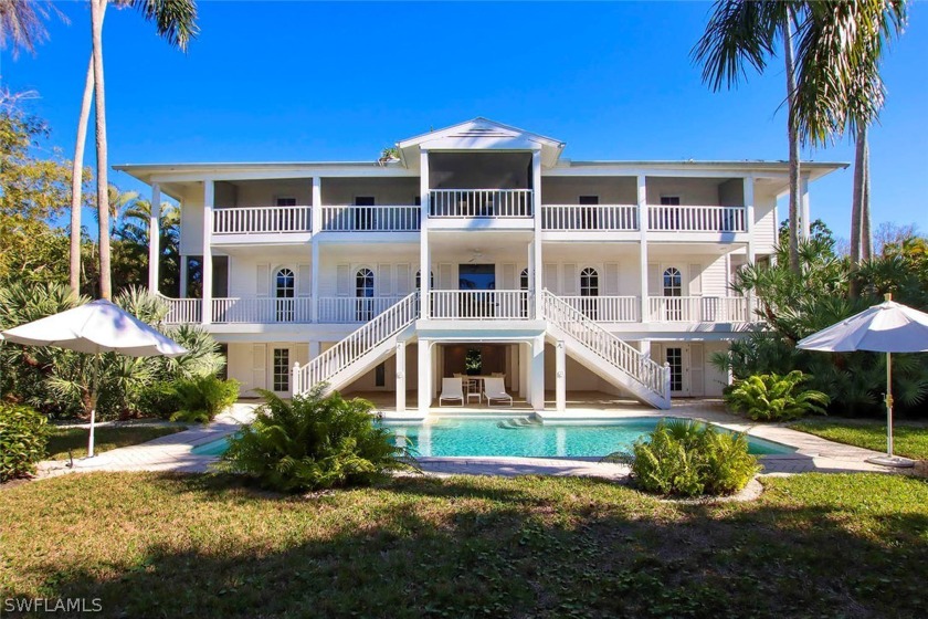 Located in heart of Island, surrounded by lush vegetation - Beach Home for sale in Sanibel, Florida on Beachhouse.com