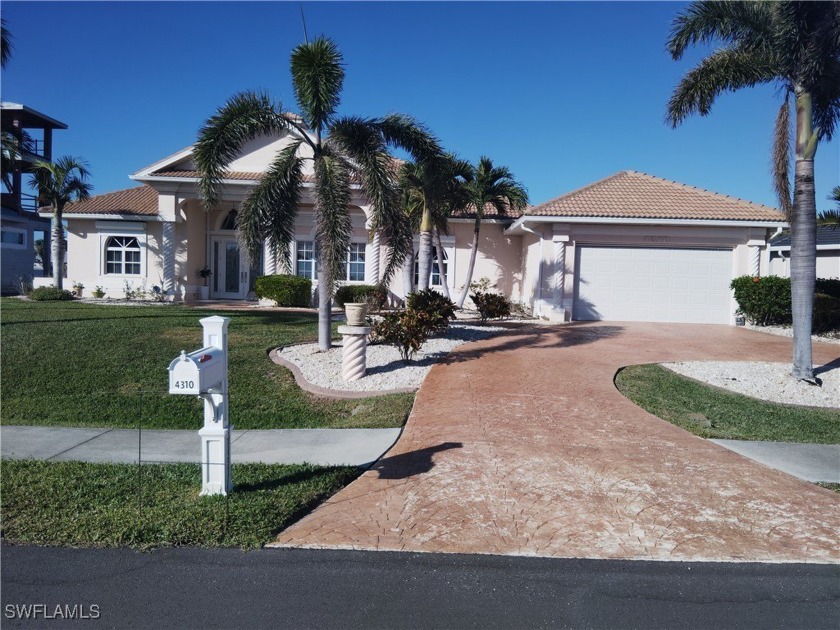 WELCOME TO THIS SLICE OF PARADISE! This GULF access 4 bed 3 bath - Beach Home for sale in Cape Coral, Florida on Beachhouse.com