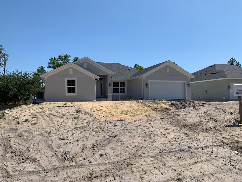 Under Construction. This Beautiful New 2117 Sqft 4 bed 3 bath - Beach Home for sale in Port Charlotte, Florida on Beachhouse.com