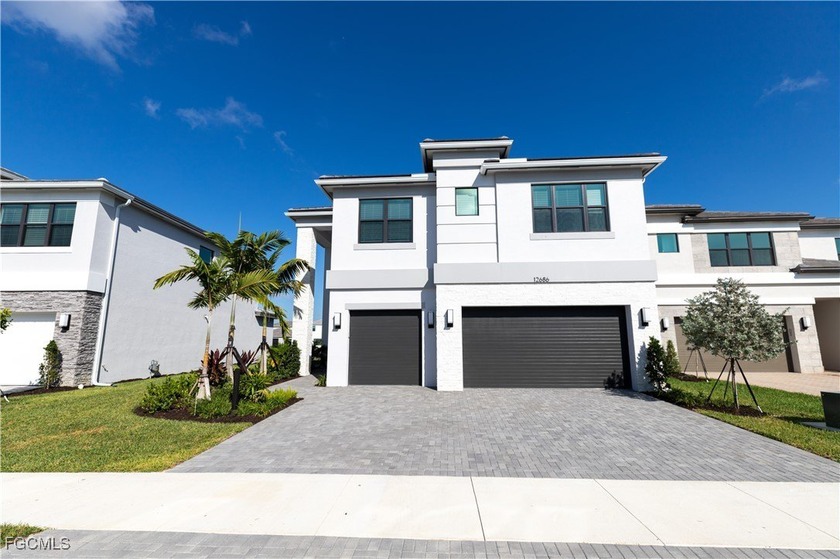 A GL HOMES Community! Stunning Olympia floor plan in the - Beach Home for sale in Estero, Florida on Beachhouse.com