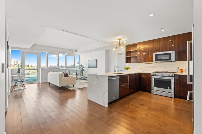 Experience sky-high sophistication in this stunning 1360 sq ft - Beach Condo for sale in Weehawken, New Jersey on Beachhouse.com