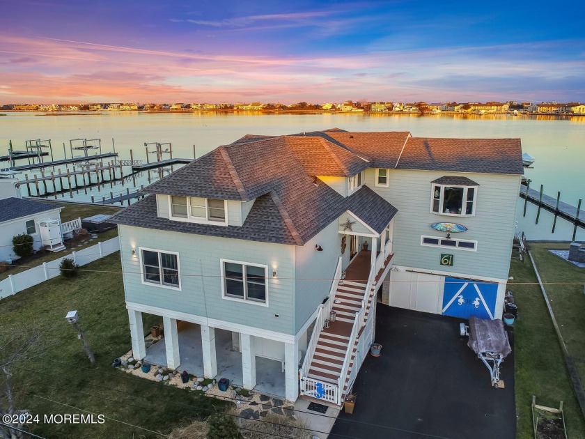 GORGEOUS WATERFRONT HOME SITUATED ON THE SHREWSBURY RIVER JUST - Beach Home for sale in Monmouth Beach, New Jersey on Beachhouse.com