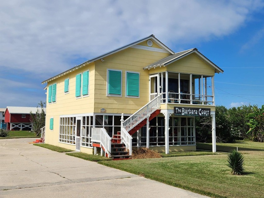 Situated on 3 adjacent lots with mature palms & oleander trees - Beach Home for sale in Grand Isle, Louisiana on Beachhouse.com