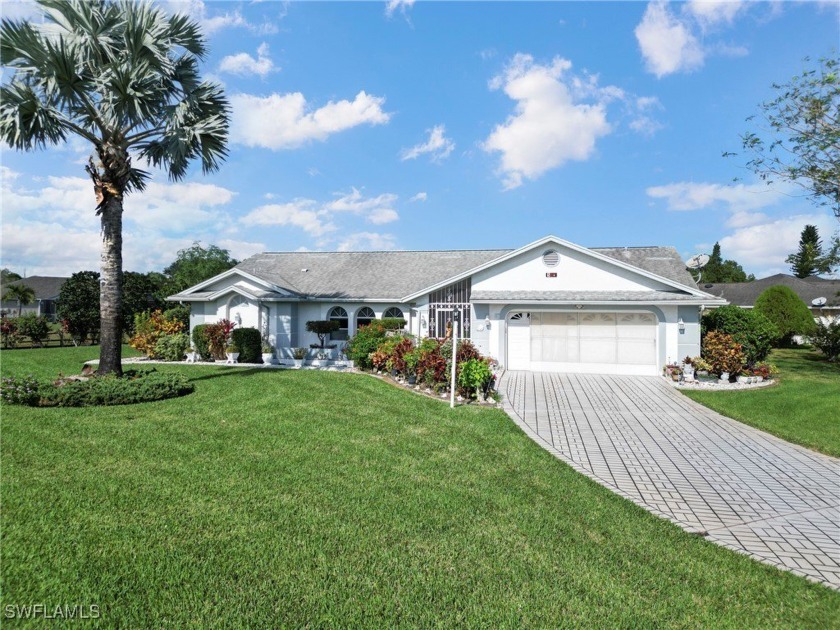 Welcome to this beautiful three bedrooms two bath house on 0.45 - Beach Home for sale in Lehigh Acres, Florida on Beachhouse.com