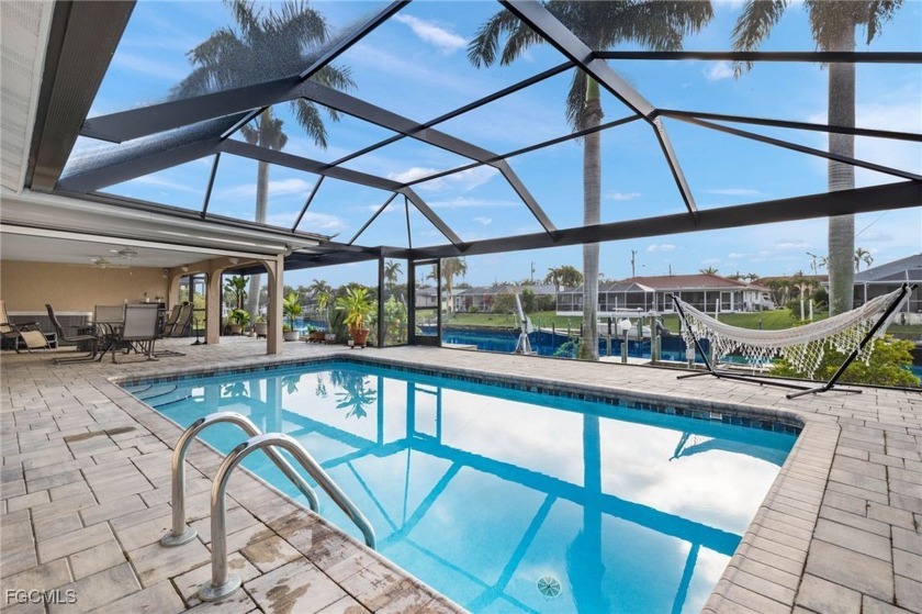Tropical Paradise Awaits! Welcome to this stunningly modernized - Beach Home for sale in Cape Coral, Florida on Beachhouse.com