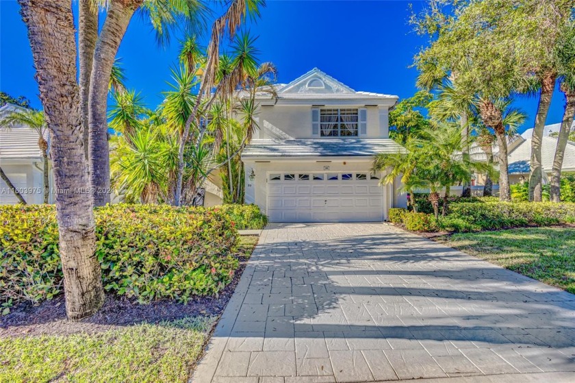 Welcome to your dream home, a stunning two-story retreat with - Beach Home for sale in Palm Beach Gardens, Florida on Beachhouse.com