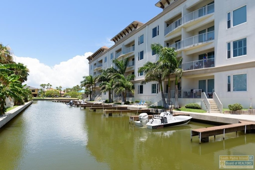 Large waterfront condo with private marina and boat slip. The - Beach Condo for sale in South Padre Island, Texas on Beachhouse.com
